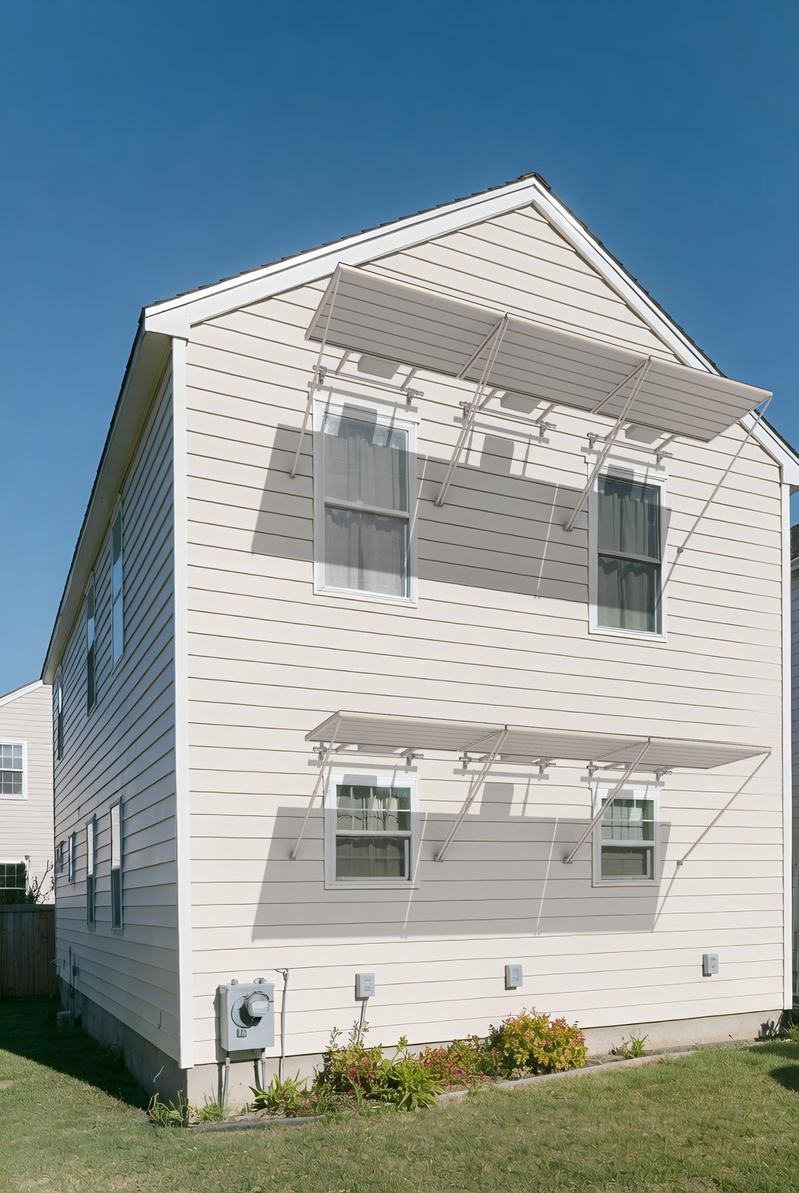 Solar panels attached above two rows of windows.